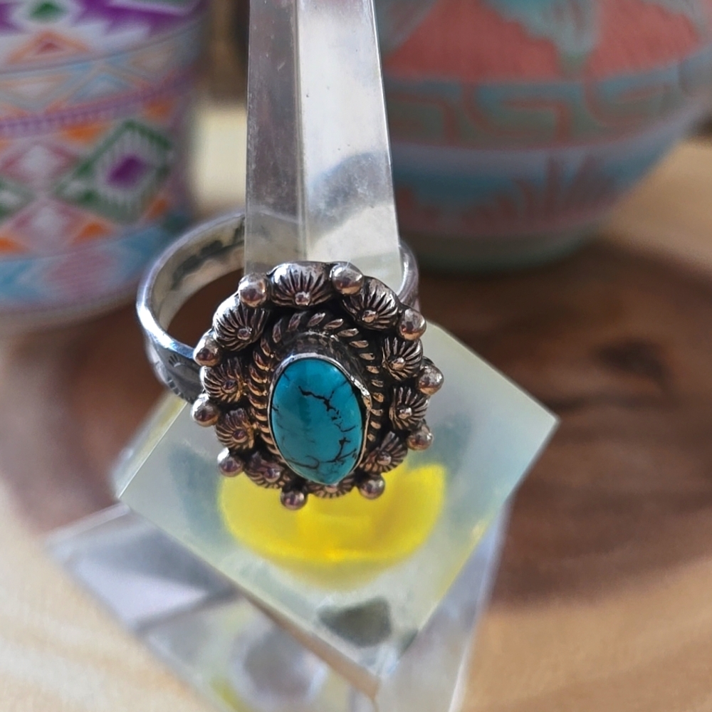 Sterling silver ring with a Turquoise cabochon.